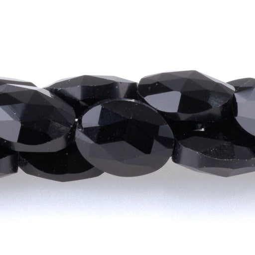 This is a Dakota Stones 8x10mm Obsidian Triangle Cut Puff Gemstone strand with faceted oval beads in 15-16 inch strand.