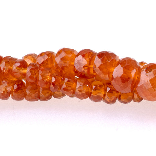 This is a Dakota Stones 3-6mm Orange Garnet Gemstone strand with faceted rondelle beads in 15-16 inch strand.