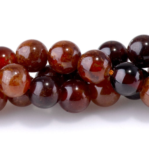 This is a Dakota Stones 6mm Orange Garnet Gemstone strand with round beads in 15-16 inch strand.