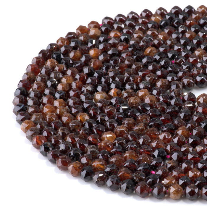 This is a Dakota Stones 6mm Orange Garnet Gemstone strand with double heart faceted round beads in 15-16 inch strand.
