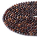 This is a Dakota Stones 6mm Orange Garnet Gemstone strand with double heart faceted round beads in 15-16 inch strand.