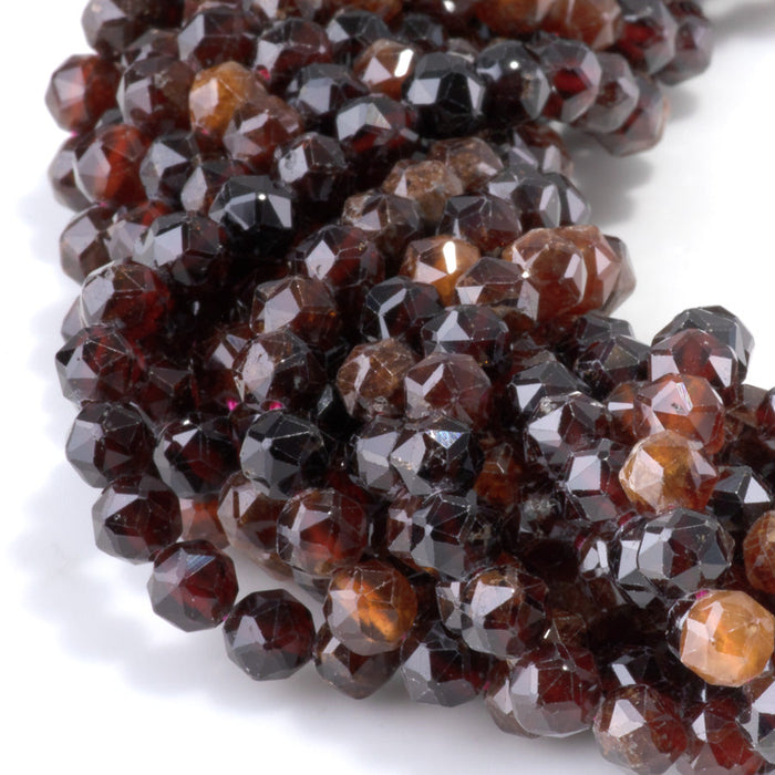 This is a Dakota Stones 6mm Orange Garnet Gemstone strand with double heart faceted round beads in 15-16 inch strand.