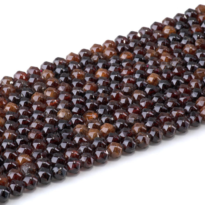This is a Dakota Stones 6mm Orange Garnet Gemstone strand with double heart faceted round beads in 15-16 inch strand.