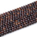 This is a Dakota Stones 6mm Orange Garnet Gemstone strand with double heart faceted round beads in 15-16 inch strand.
