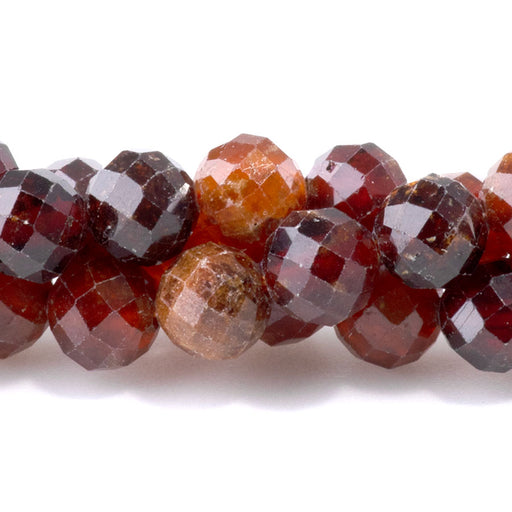 This is a Dakota Stones 6mm Orange Garnet Gemstone strand with faceted round beads in 8 inch strand.