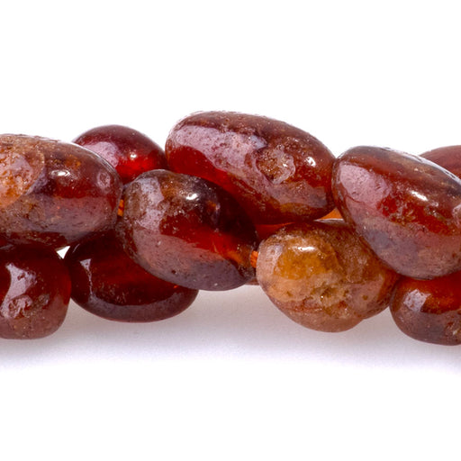 This is a Dakota Stones Orange Garnet pebble from the Dakota Stones collection.
