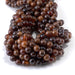 This is a Dakota Stones 8mm Orange Garnet Gemstone strand with round beads in 15-16 inch strand.