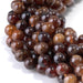 This is a Dakota Stones 8mm Orange Garnet Gemstone strand with round beads in 15-16 inch strand.
