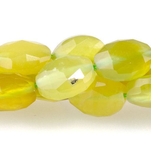 This is a Dakota Stones 8x10mm Olive Jade Triangle Cut Puff Gemstone strand with A grade faceted oval beads in 15-16 inch strand.