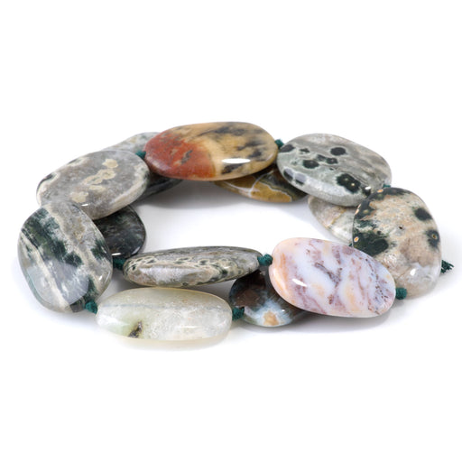 This is a Dakota Stones 18x28-20x30mm Ocean Jasper Gemstone strand with A grade oval beads in 15-16 inch strand.