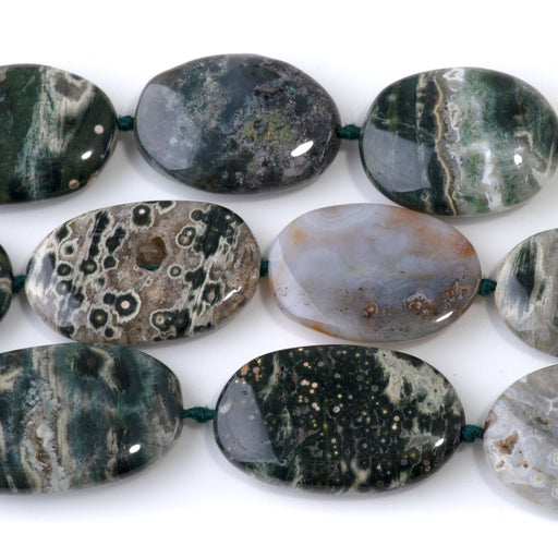 This is a Dakota Stones 18x28-20x30mm Ocean Jasper Gemstone strand with A grade oval beads in 15-16 inch strand.