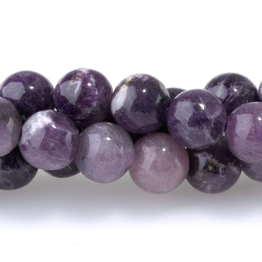 This is a Dakota Stones 6mm Purple Fluorite Gemstone strand with A grade round beads in 15-16 inch strand.