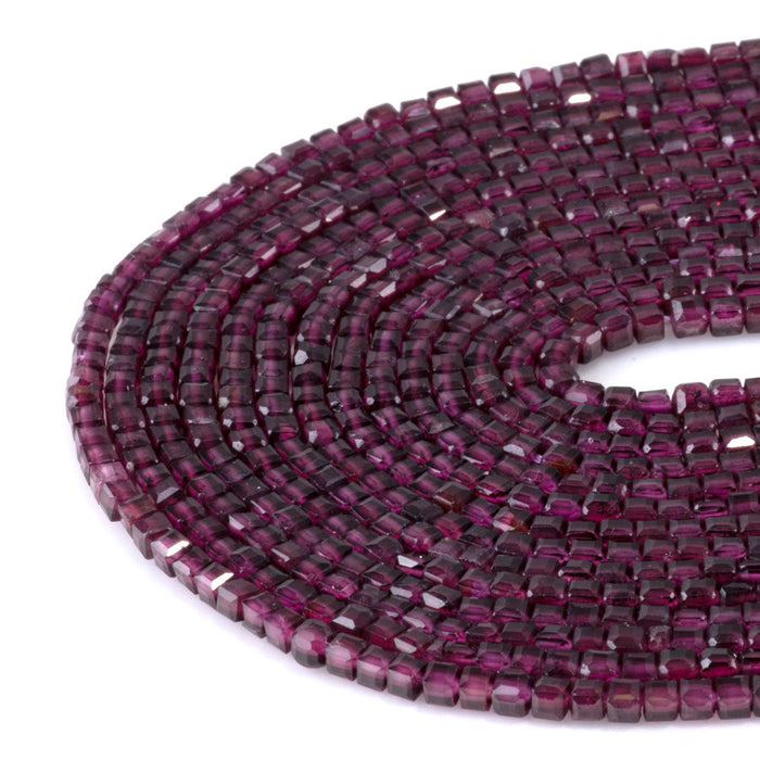 This is a Dakota Stones 3mm Purple Garnet Gemstone strand with A grade table-cut cube beads in 15-16 inch strand.
