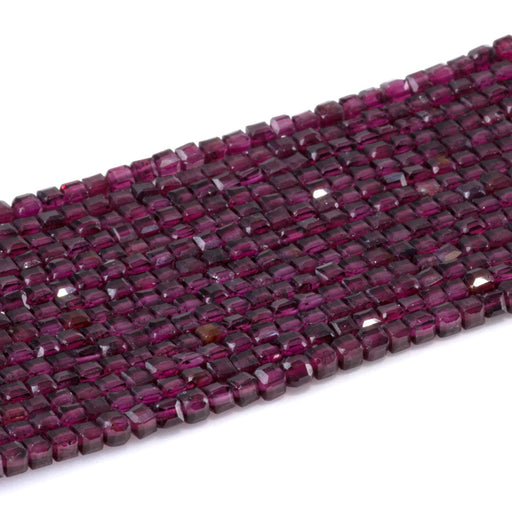 This is a Dakota Stones 3mm Purple Garnet Gemstone strand with A grade table-cut cube beads in 15-16 inch strand.