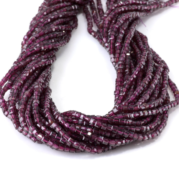 This is a Dakota Stones 3mm Purple Garnet Gemstone strand with A grade table-cut cube beads in 15-16 inch strand.