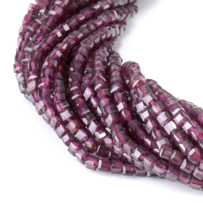 This is a Dakota Stones 3mm Purple Garnet Gemstone strand with A grade table-cut cube beads in 15-16 inch strand.