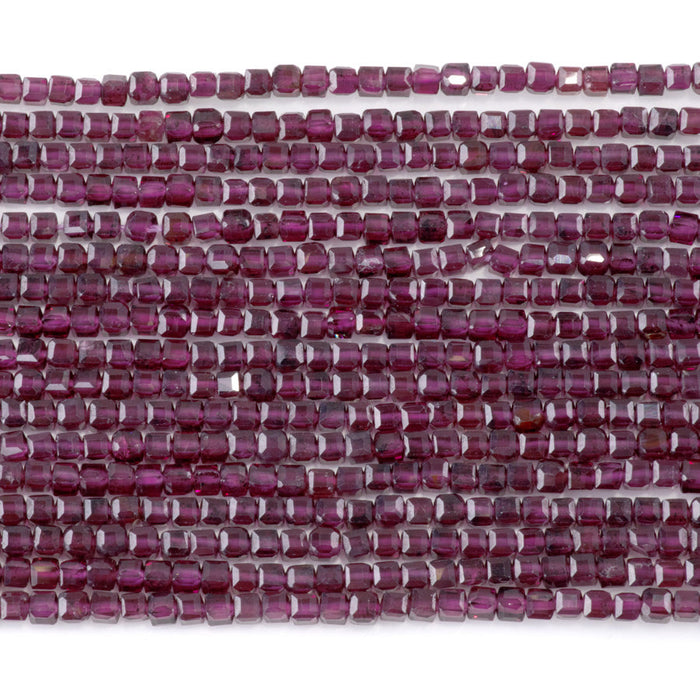 This is a Dakota Stones 3mm Purple Garnet Gemstone strand with A grade table-cut cube beads in 15-16 inch strand.