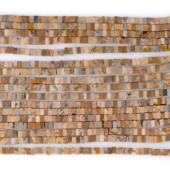 This is a Dakota Stones 1x2mm Picture Jasper Gemstone strand with rondelle square beads in 15-16 inch strand.