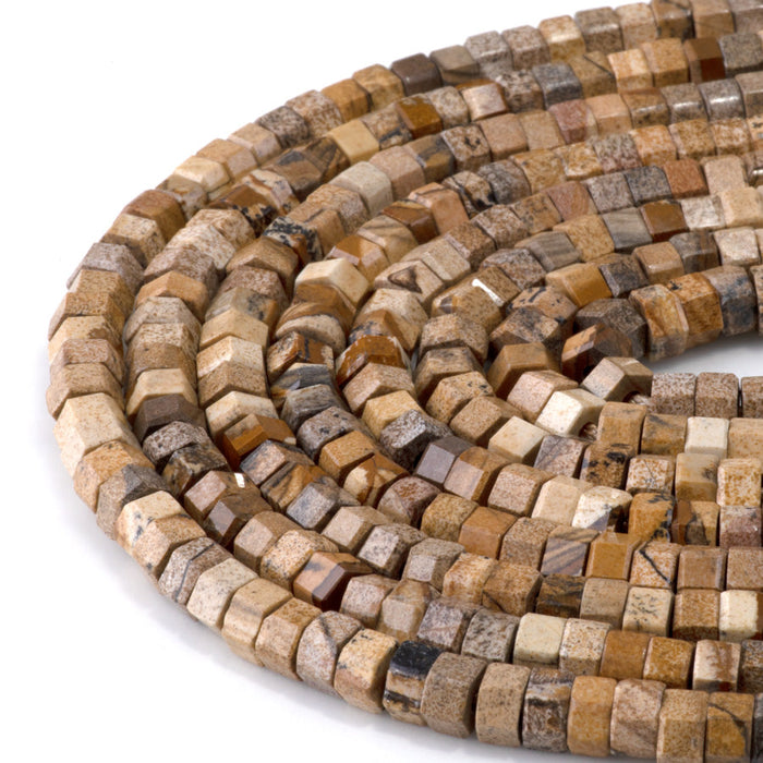 This is a Dakota Stones 6mm Picture Jasper Large Hole Gemstone strand with faceted hexagon beads in 8 inch strand.