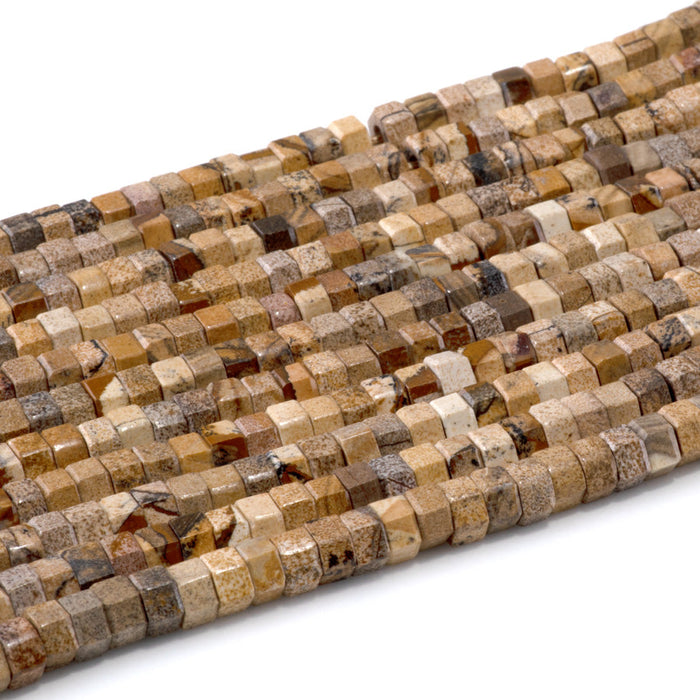 This is a Dakota Stones 6mm Picture Jasper Large Hole Gemstone strand with faceted hexagon beads in 8 inch strand.
