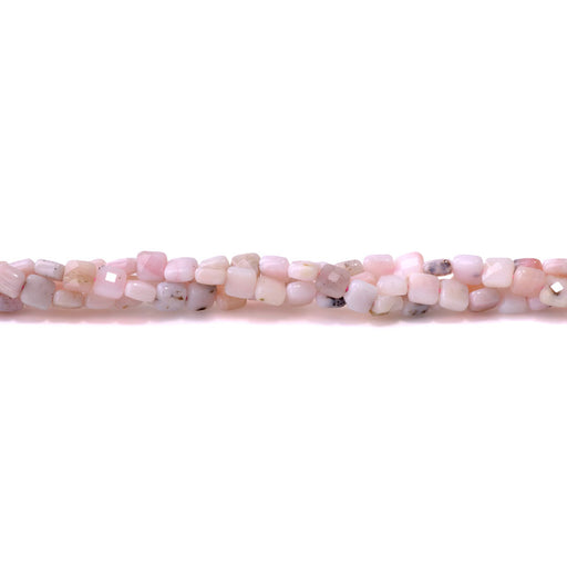 This is a Dakota Stones 6mm Pink Opal Gemstone strand with faceted square beads in 15-16 inch strand.