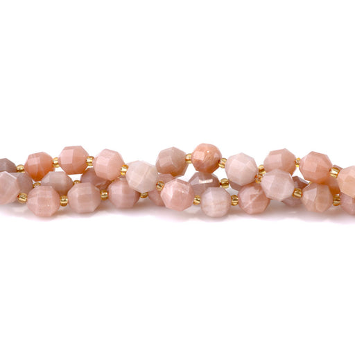 This is a Dakota Stones 10mm Peach Moonstone Energy Prism Gemstone strand with A grade faceted beads in 15-16 inch strand.