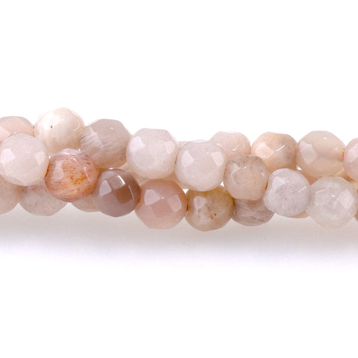 This is a Dakota Stones 4mm Banded Peach Moonstone Gemstone strand with faceted round beads in 15-16 inch strand.