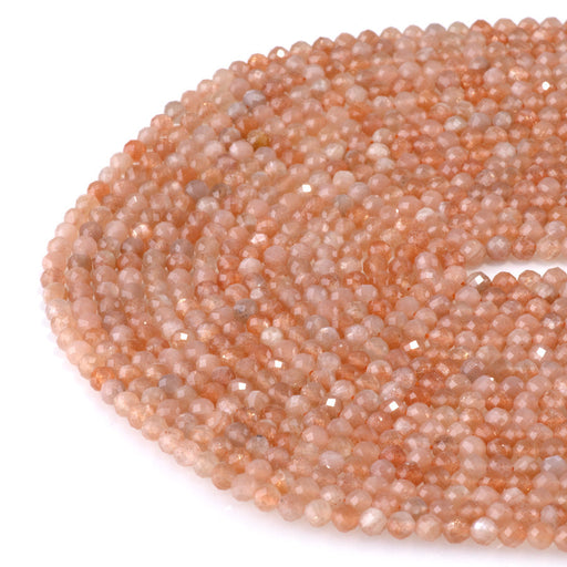 This is a Dakota Stones 4mm Peach Moonstone Gemstone strand with AA grade faceted round beads in 15-16 inch strand.