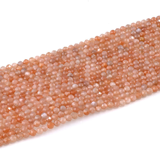 This is a Dakota Stones 4mm Peach Moonstone Gemstone strand with AA grade faceted round beads in 15-16 inch strand.