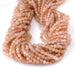This is a Dakota Stones 4mm Peach Moonstone Gemstone strand with AA grade faceted round beads in 15-16 inch strand.