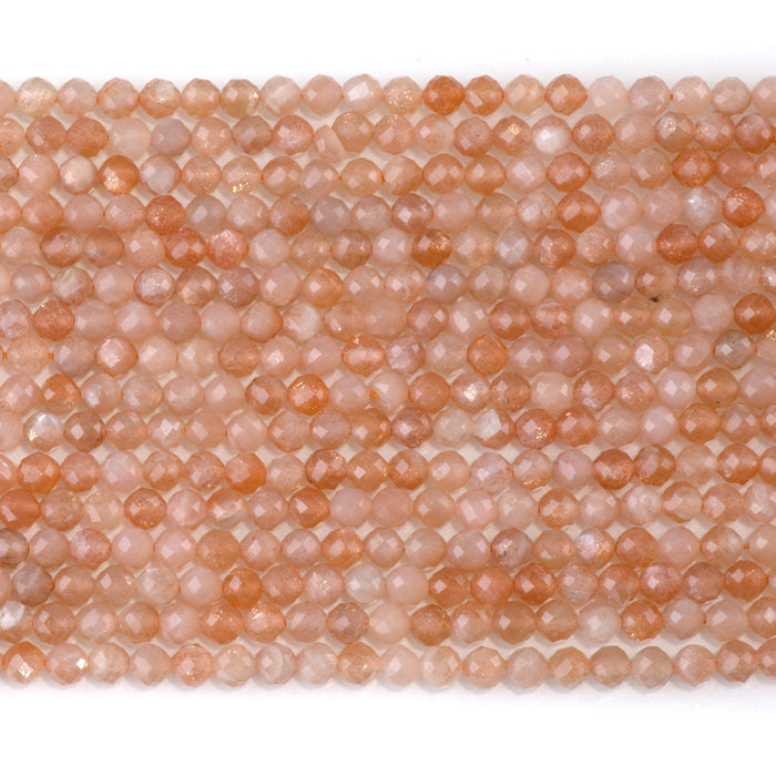 This is a Dakota Stones 4mm Peach Moonstone Gemstone strand with AA grade faceted round beads in 15-16 inch strand.