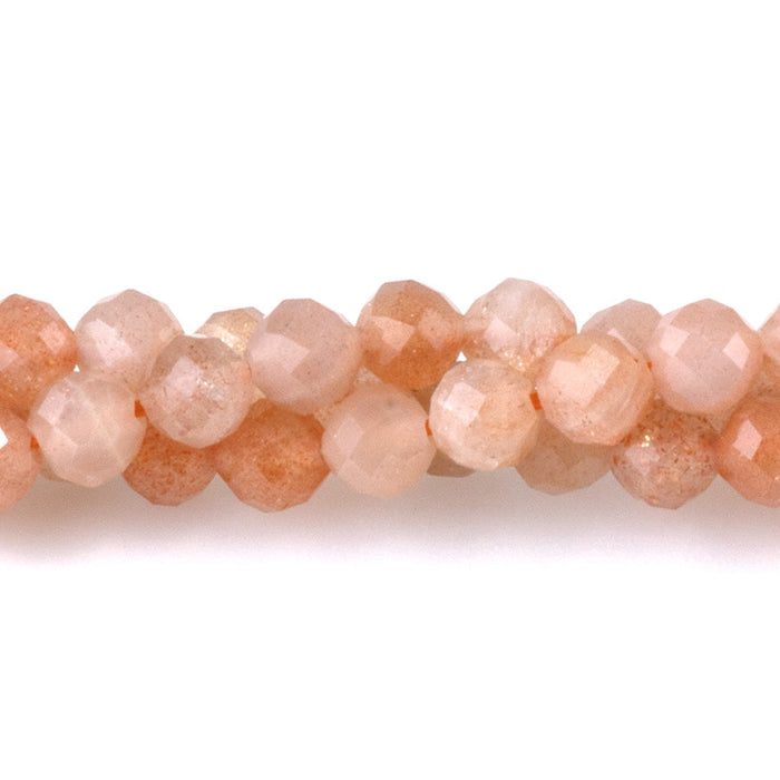 This is a Dakota Stones 4mm Peach Moonstone Gemstone strand with AA grade faceted round beads in 15-16 inch strand.