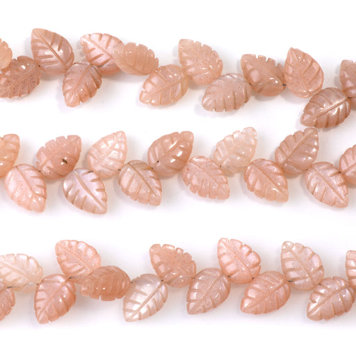 This is a Dakota Stones 8x11mm Peach Moonstone Leaf Gemstone strand of round beads in 8 inch strand.