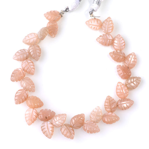 This is a Dakota Stones 8x11mm Peach Moonstone Leaf Gemstone strand of round beads in 8 inch strand.