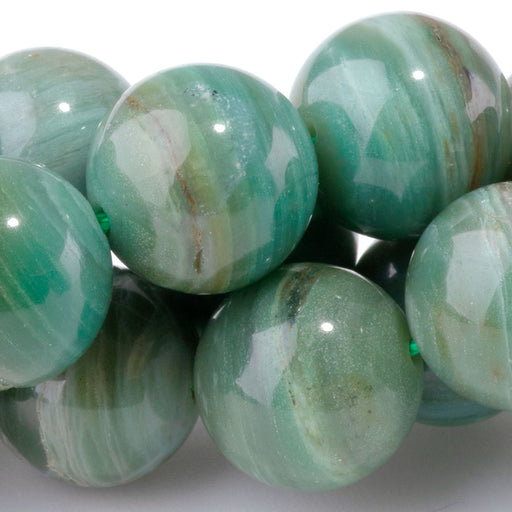 This is a Dakota Stones 12mm Pilbara Prase Gemstone strand with AA grade round beads in 15-16 inch strand.