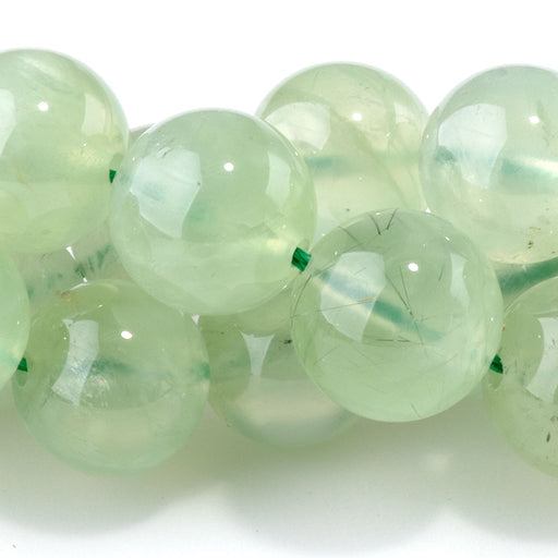 This is a Dakota Stones 10mm Prehnite Gemstone strand with AAA grade round beads in 15-16 inch strand.