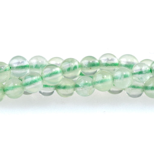 This is a Dakota Stones 4mm Prehnite Gemstone strand with AAA grade round beads in 15-16 inch strand.