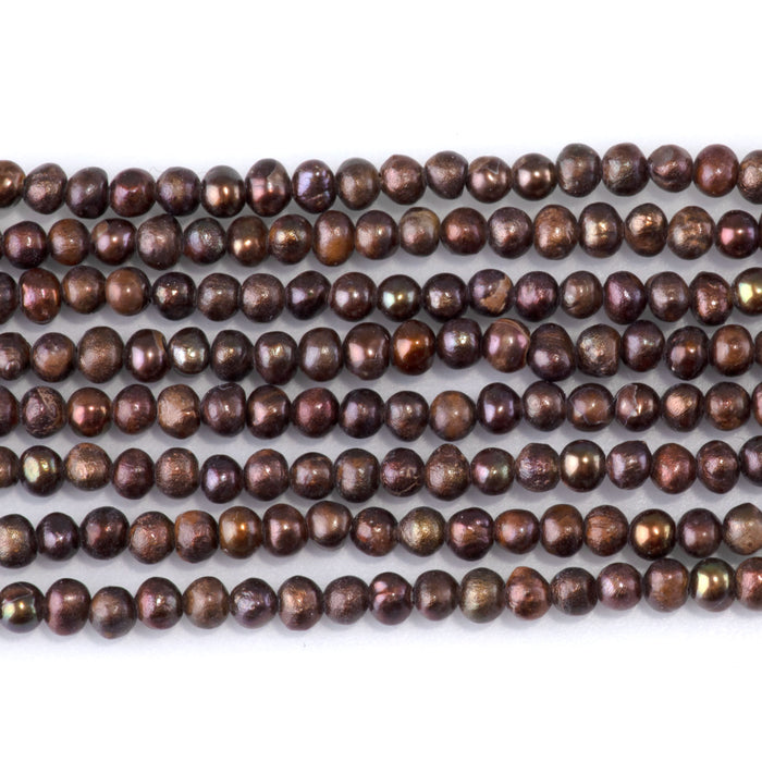This is a Dakota Stones 5-3mm Freshwater Pearl Dark Brown Potato Gemstone strand of round beads in 15-16 inch strand.