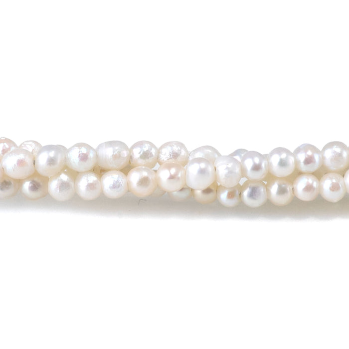 This is a Dakota Stones 5-3mm Freshwater Pearl White Potato Gemstone strand of round beads in 15-16 inch strand.
