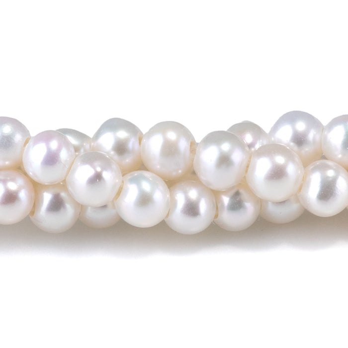 This is a Dakota Stones 4-5mm Freshwater Pearl White Potato Large Gemstone strand of round beads in 8 inch strand.