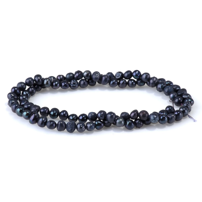 This is a Dakota Stones 4mm Freshwater Pearl Black Semi Gemstone strand with round beads in 15-16 inch strand.