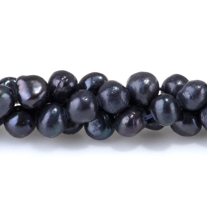 This is a Dakota Stones 4mm Freshwater Pearl Black Semi Gemstone strand with round beads in 15-16 inch strand.