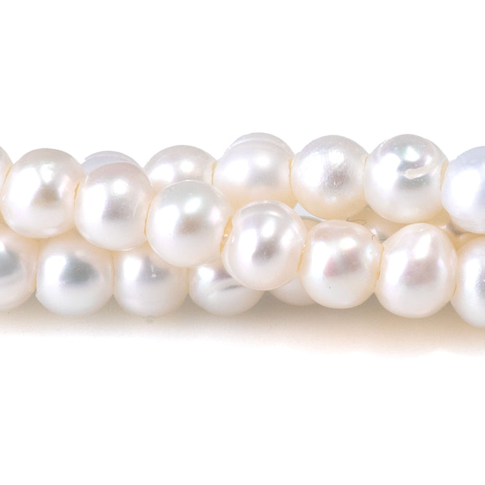This is a Dakota Stones 5-6mm Freshwater Pearl White Potato Large Gemstone strand of round beads in 8 inch strand.