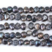 This is a Dakota Stones 6-10mm Freshwater Pearl Grey Peacock Button Gemstone strand with irregular beads in 8 inch strand.