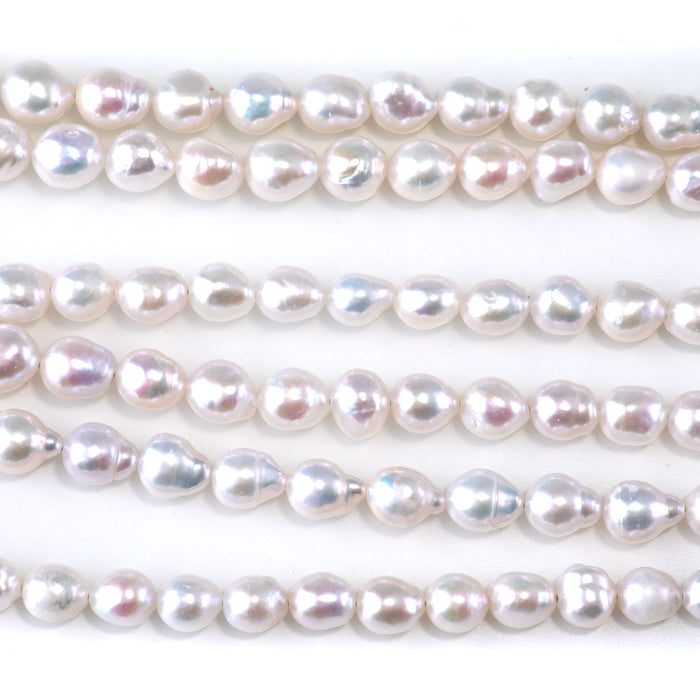 This is a Dakota Stones 6-7mm Freshwater Pearl White Potato Gemstone strand of round beads in 15-16 inch strand.
