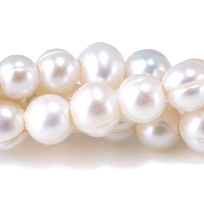 This is a Dakota Stones 6-7mm Freshwater Pearl White Potato Large Gemstone strand of round beads in 8 inch strand.