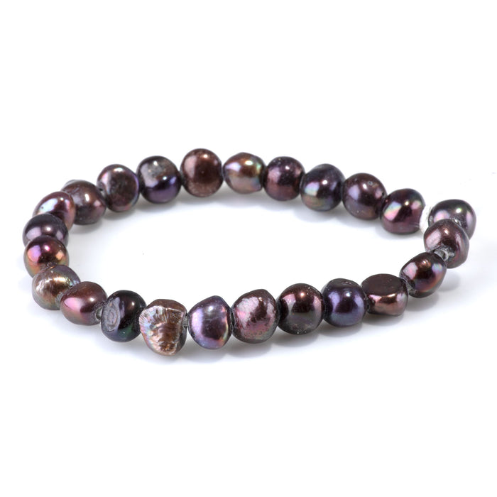 This is a Dakota Stones 7-10mm Freshwater Pearl Peacock Button Large Gemstone strand with irregular beads in 8 inch strand.