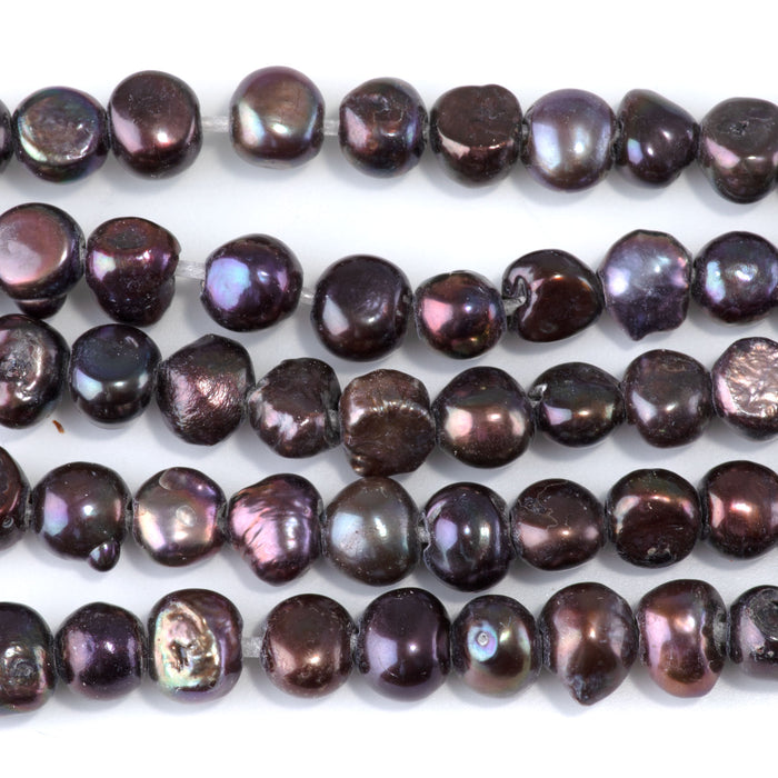This is a Dakota Stones 7-10mm Freshwater Pearl Peacock Button Large Gemstone strand with irregular beads in 8 inch strand.