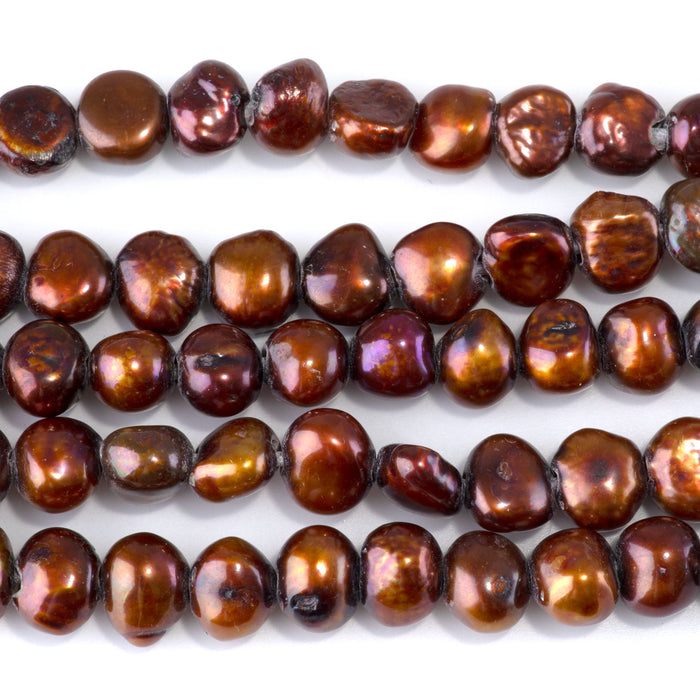 This is a Dakota Stones 8-11mm Freshwater Pearl Red Brown Gold Gemstone strand with irregular beads in 8 inch strand.