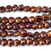 This is a Dakota Stones 8-11mm Freshwater Pearl Red Brown Gold Gemstone strand with irregular beads in 8 inch strand.